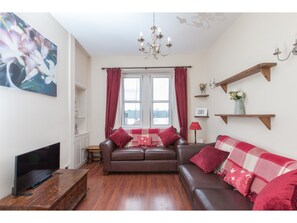 Apartment, 1 Bedroom | Living area | 40-inch TV with satellite channels