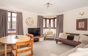 Apartment (2 Bedrooms) | Living area | 50-inch flat-screen TV with digital channels, TV, Netflix