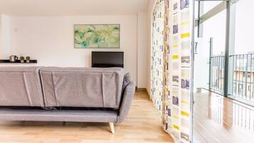 Apartment (2 Bedrooms) | Living area | 40-inch TV with digital channels