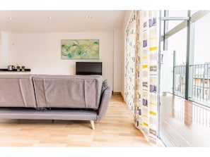 Apartment (2 Bedrooms) | Living area | 40-inch TV with digital channels