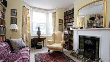 House (4 Bedrooms) | Living area | TV, fireplace, DVD player, books