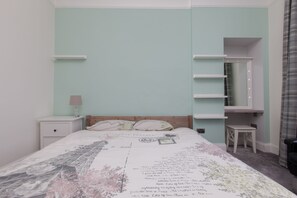 Apartamento (2 Bedrooms) | 2 quartos, ferros/tábuas de passar roupa, Wi-Fi de cortesia