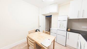 Full-sized fridge, microwave, coffee/tea maker, cookware/dishes/utensils