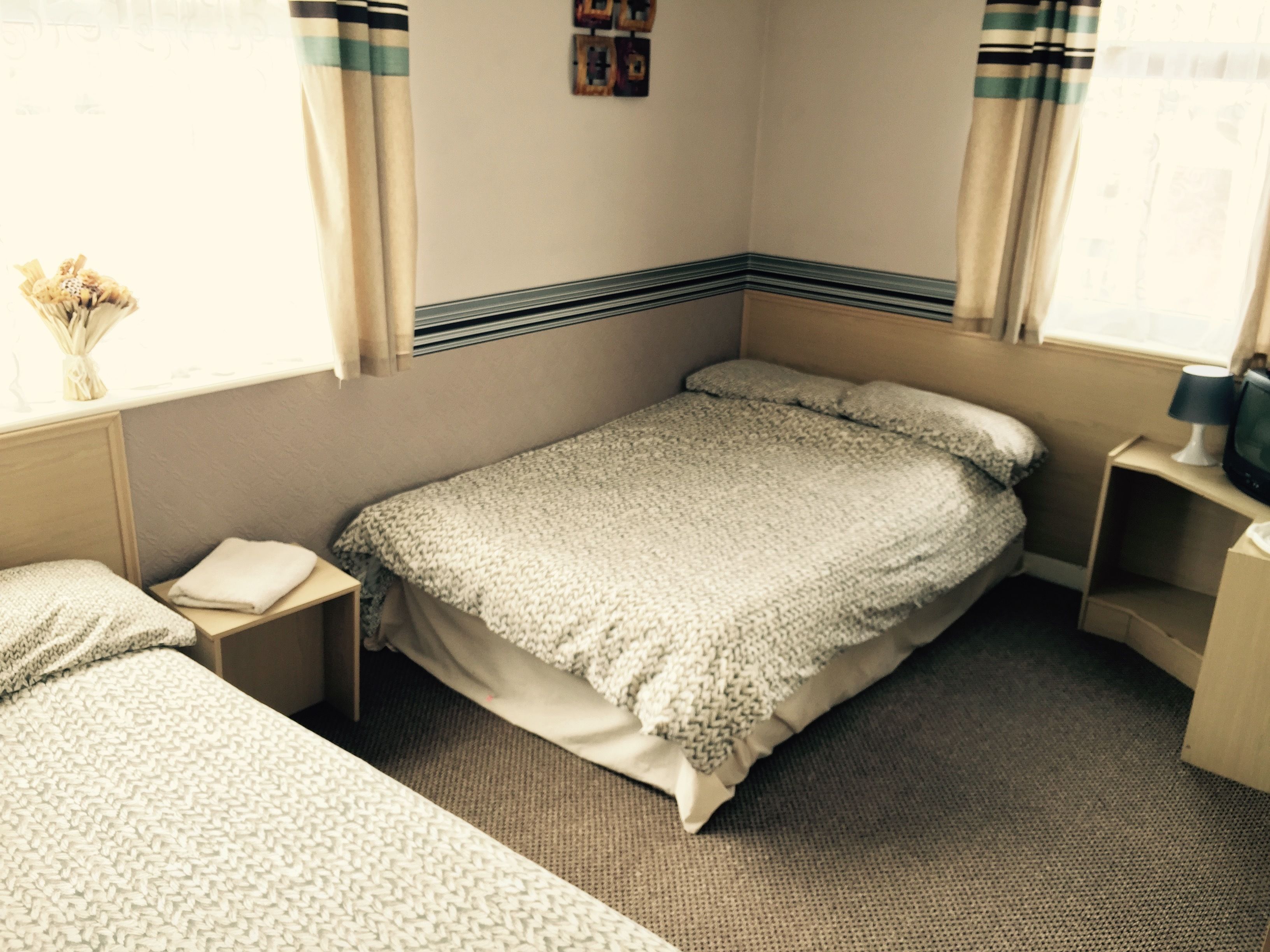 family room, 2 double beds | iron/ironing board, free wifi, bed sheets