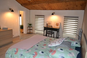 Premium bedding, blackout curtains, soundproofing, travel cot