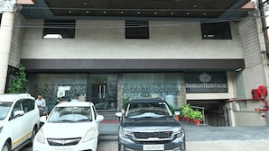A building with a sign reading "SIMRAN HERITAGE". - Hotel Simran Heritage (Raipur)