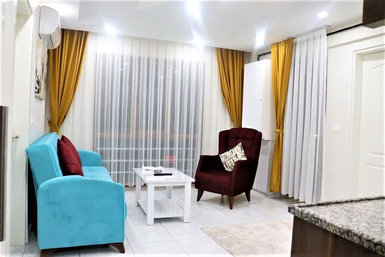 Apartment, 2 Schlafzimmer | Wohnbereich | 43-Zoll-LCD-Fernseher mit Satellitenempfang, Fernseher