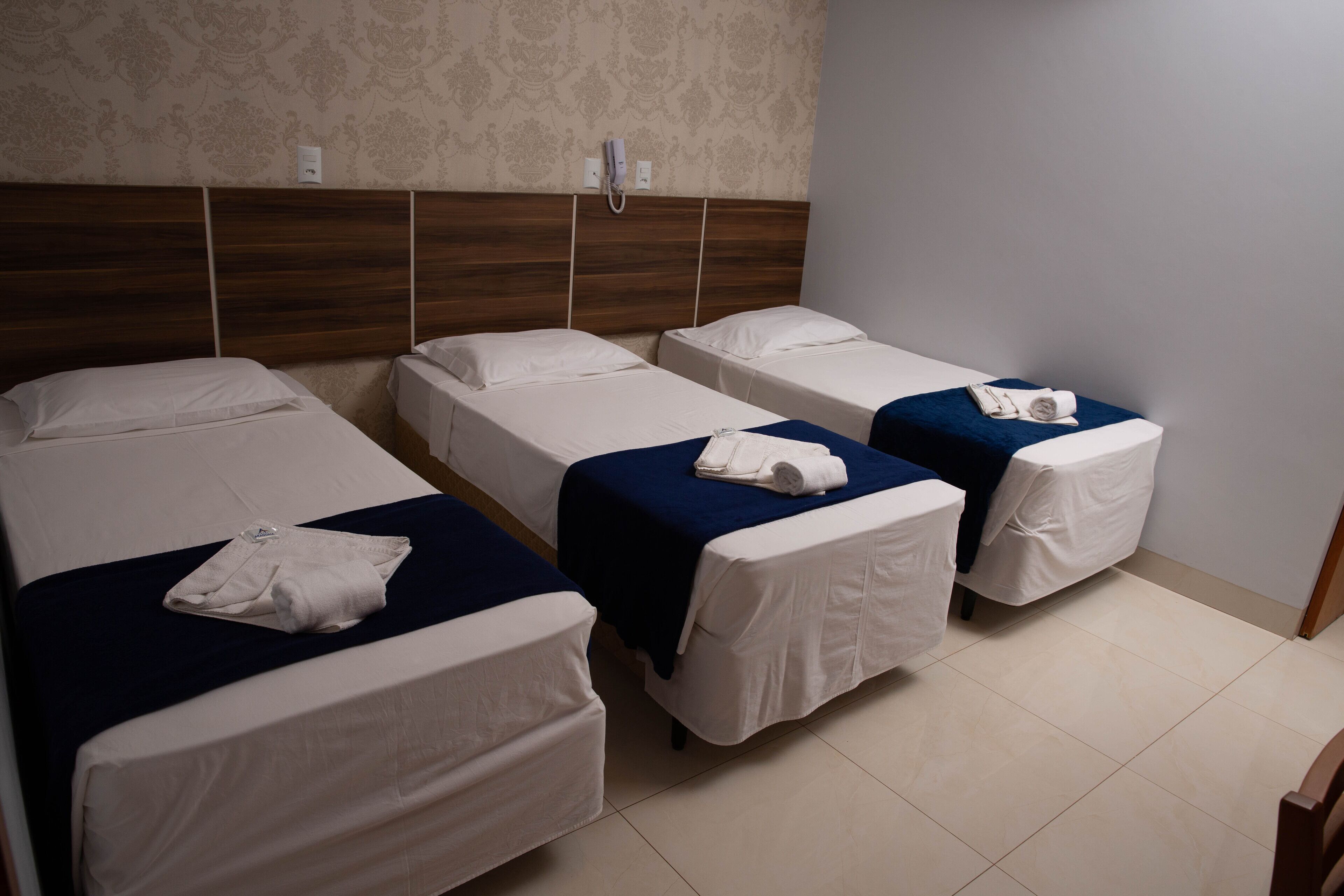 superior triple room, 3 single beds | minibar, in-room safe, desk, blackout curtains