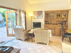 Smart TV, fireplace, books