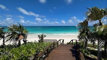 On the beach, sun loungers, beach towels
