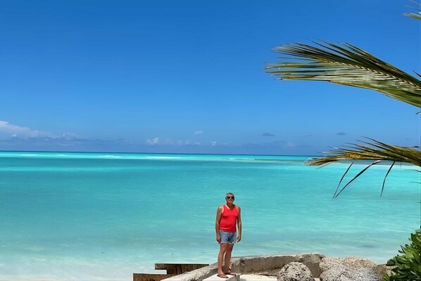 On the beach, sun loungers, beach towels