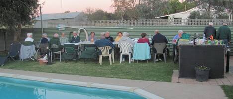 Seasonal outdoor pool, open 6 AM to 9 PM, pool loungers