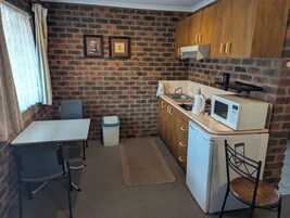 Self Contained Room | Private kitchen | Microwave, coffee/tea maker, electric kettle, cookware/dishes/utensils