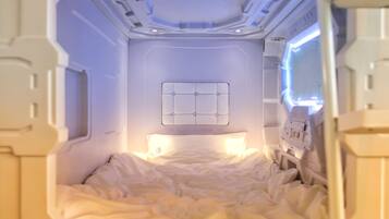 Rear Entrance Single Capsule Bed | Premium bedding, laptop workspace, free WiFi, bed sheets