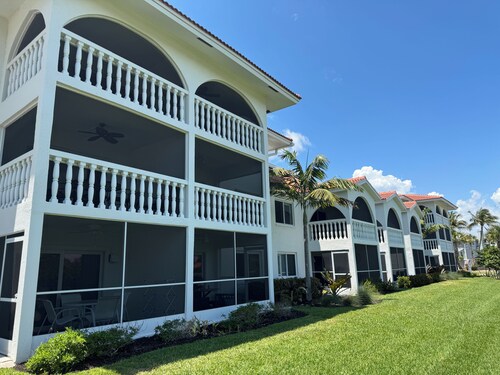 End unit with extra windows. Steps to the beach, private beach access!