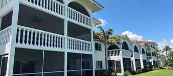 End unit with extra windows. Steps to the beach, private beach access!