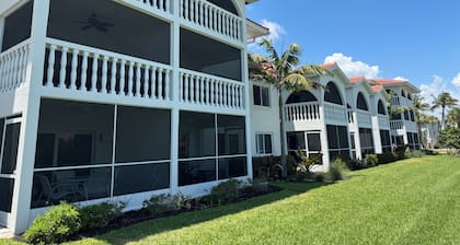End unit with extra windows. Steps to the beach, private beach access!