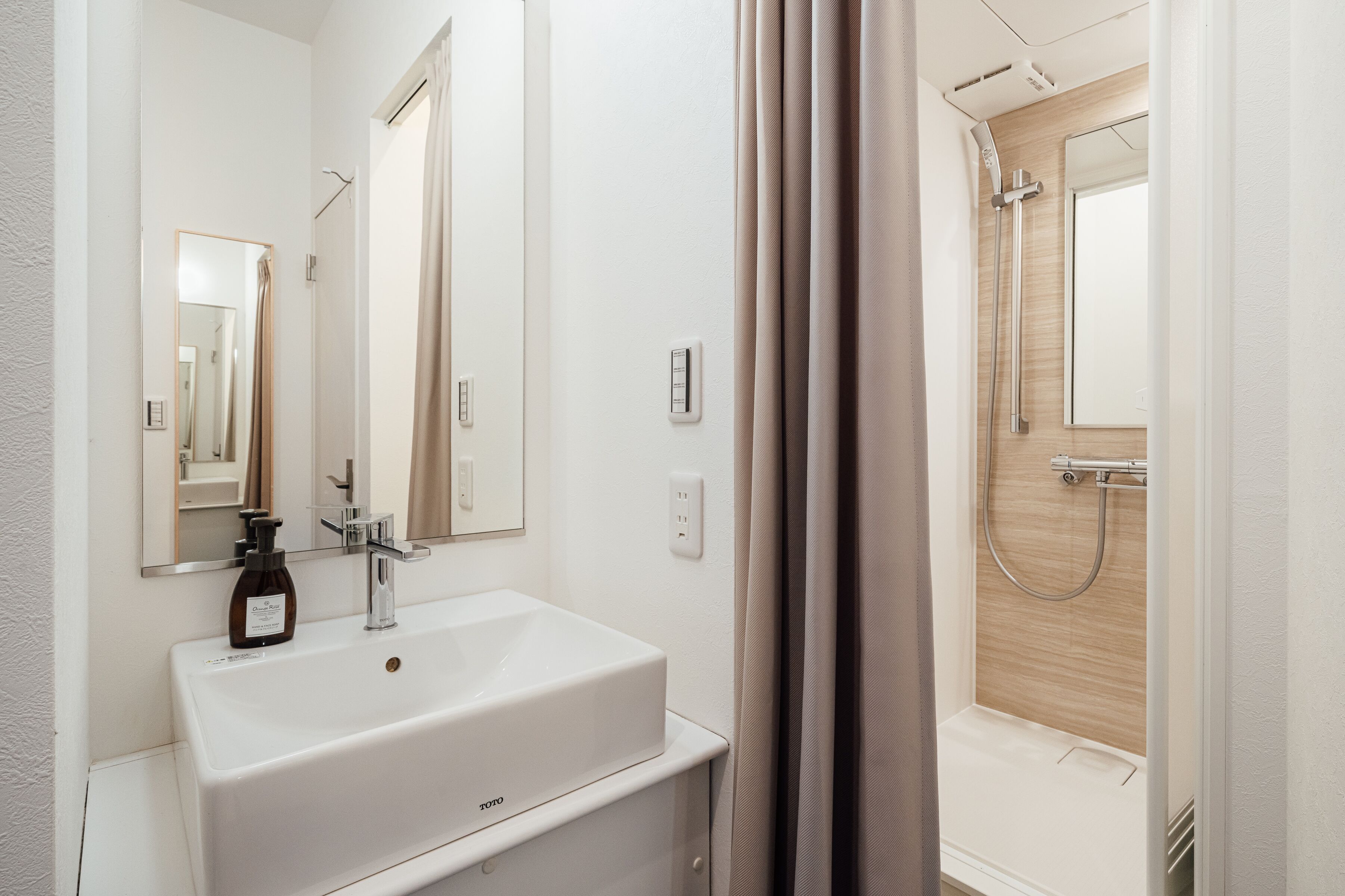 shower, eco-friendly toiletries, hair dryer, slippers