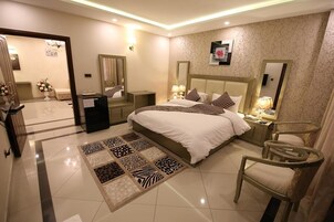 Royal Suite, 2 Bedrooms | Desk, iron/ironing board, bed sheets