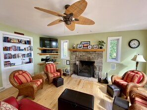 Smart TV, fireplace, DVD player, books