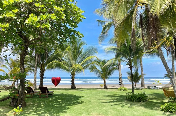On the beach, sun loungers, beach towels