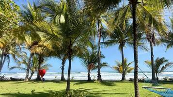 On the beach, sun-loungers, beach towels
