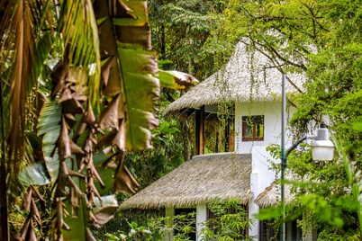 Welcoming open-air suite with large patio and easy beach access