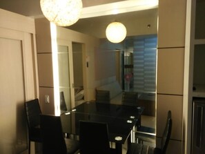1 Bedroom Condo | In-room dining - 1 Bedroom Condo at Sea Residences by JC (Pasay)