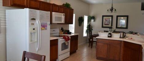 Family Villa, Hot Tub, Garden Area | Shared kitchen | Fridge, microwave, oven