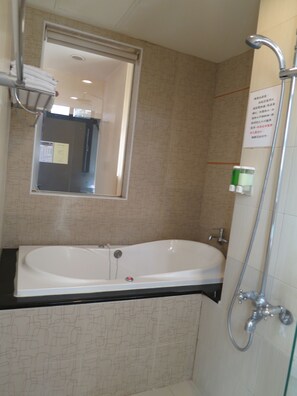 Deluxe Suite, Multiple Beds, Non Smoking | Bathroom | Hair dryer, slippers, towels, shampoo - Tan Hui Hotel (Yuchi)