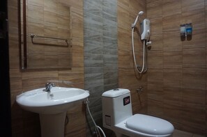 Ducha, artículos de tocador gratuitos, toallas