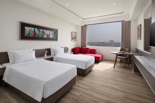 Premium bedding, in-room safe, individually decorated