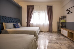 A hotel room with two beds, a headboard, a wardrobe, and a window with curtains. - The Forum Condominium by Brassalova 74 (Kuala Lumpur)