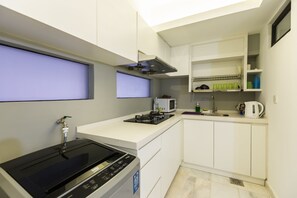 高级公寓, 3 间卧室 | 私人简易厨房 | 大冰箱、微波炉、烤箱、炉灶