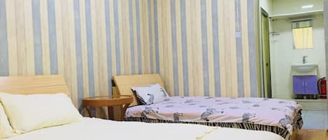 Habitación familiar | Cortinas opacas y wifi gratis