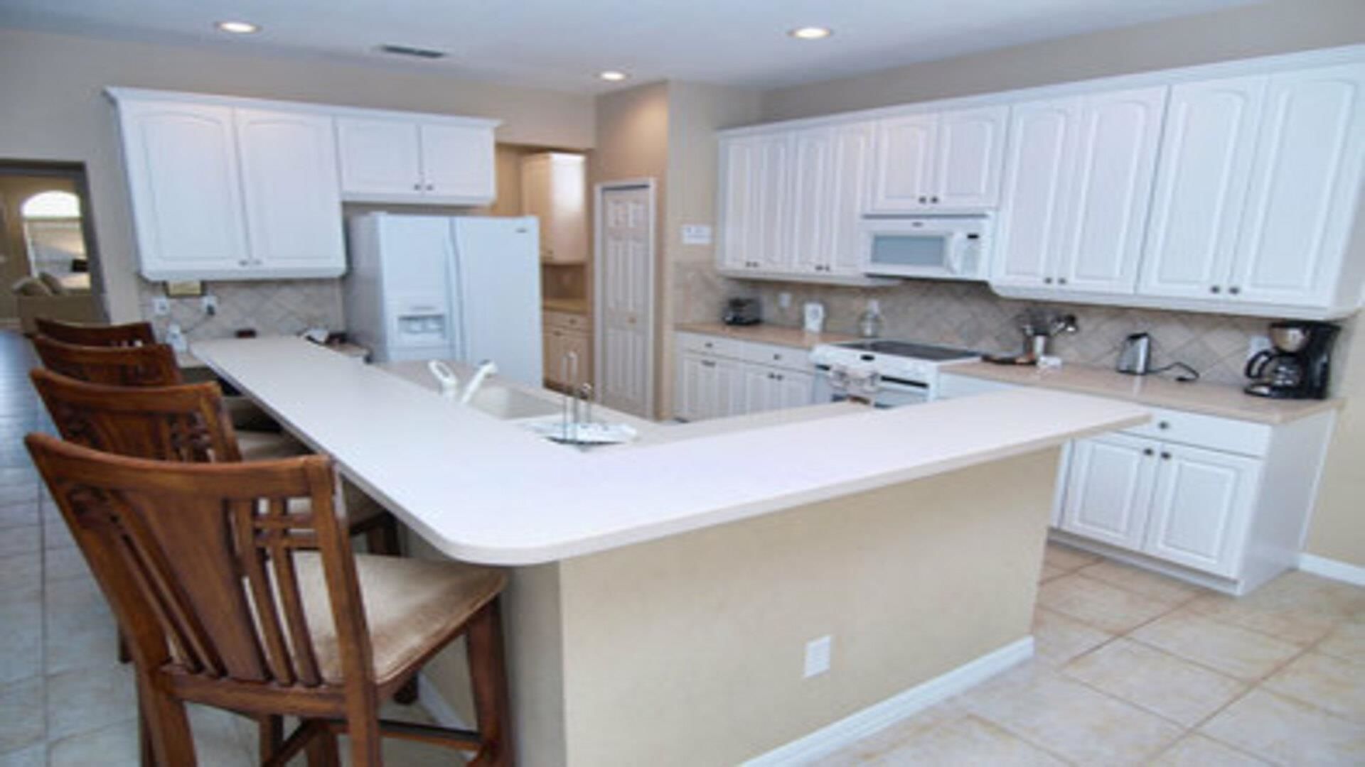 Family Villa, Garden Area | Shared kitchen | Fridge, microwave, oven