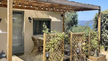 Chambre Triple Classique | Terrasse/Patio