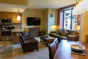 Studio | Living area | Flat-screen TV, fireplace