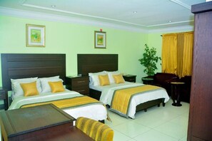 Desk, bed sheets - Sun On Hotel (Lagos)