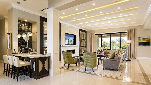 A modern living area with a kitchen, dining space, and seating area. - Je58859 - Reunion Resort - 8 Bed 8 Baths Villa (Kissimmee)