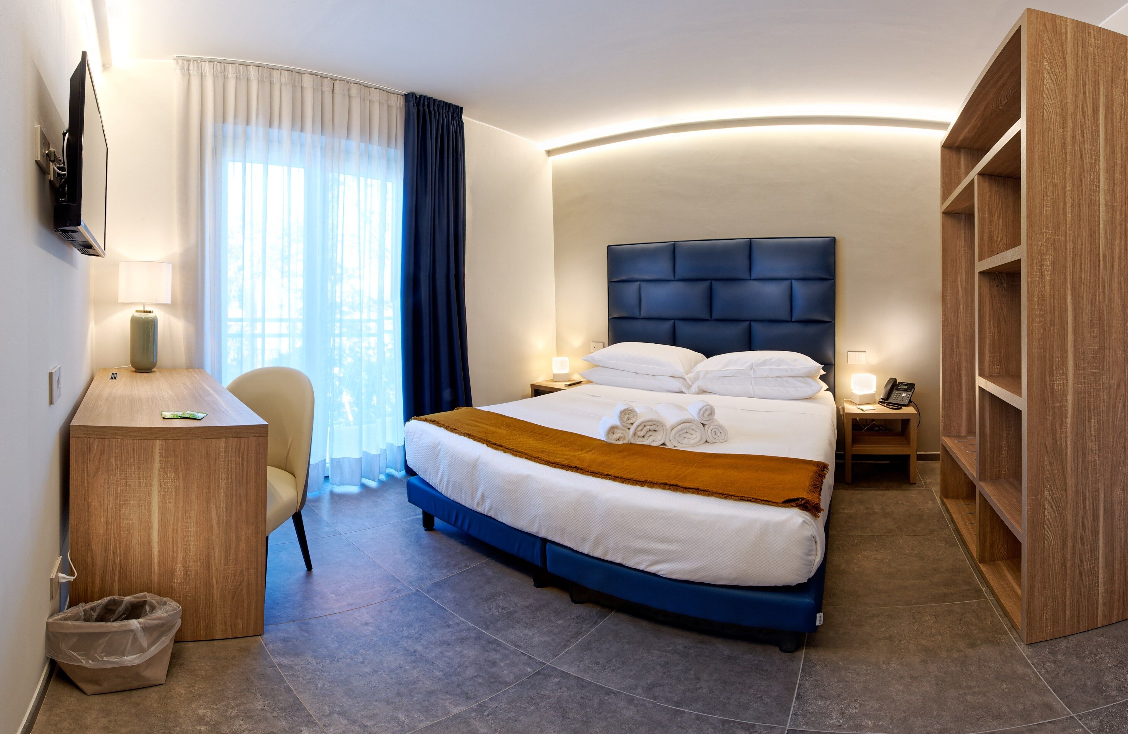 deluxe double room (design) | 1 bedroom, in-room safe, desk, blackout curtains