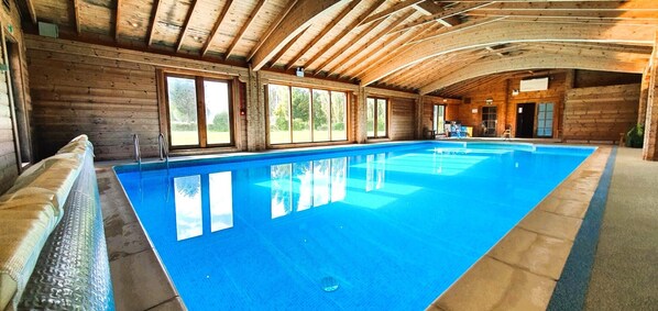Indoor pool, a heated pool, open 9:00 AM to 7:00 PM, sun loungers - The Victorian Barn self catering holidays with pool & hot tubs (Blandford Forum)