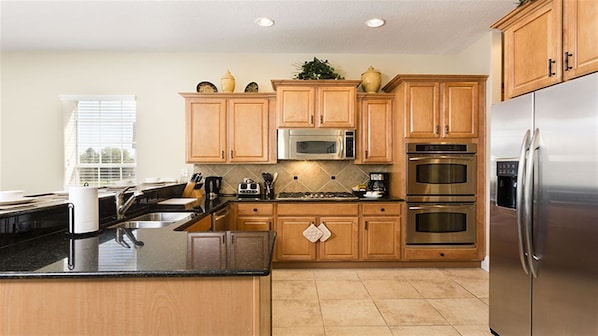 Family Villa, Hot Tub, Garden Area | Shared kitchen | Fridge, microwave, oven