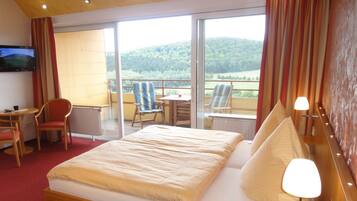Kamar Double Comfort, balkon | Meja kerja, tempat tidur bayi gratis, dan tempat tidur lipat/tambahan