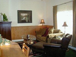 Flat-screen TV, fireplace, DVD player, stereo