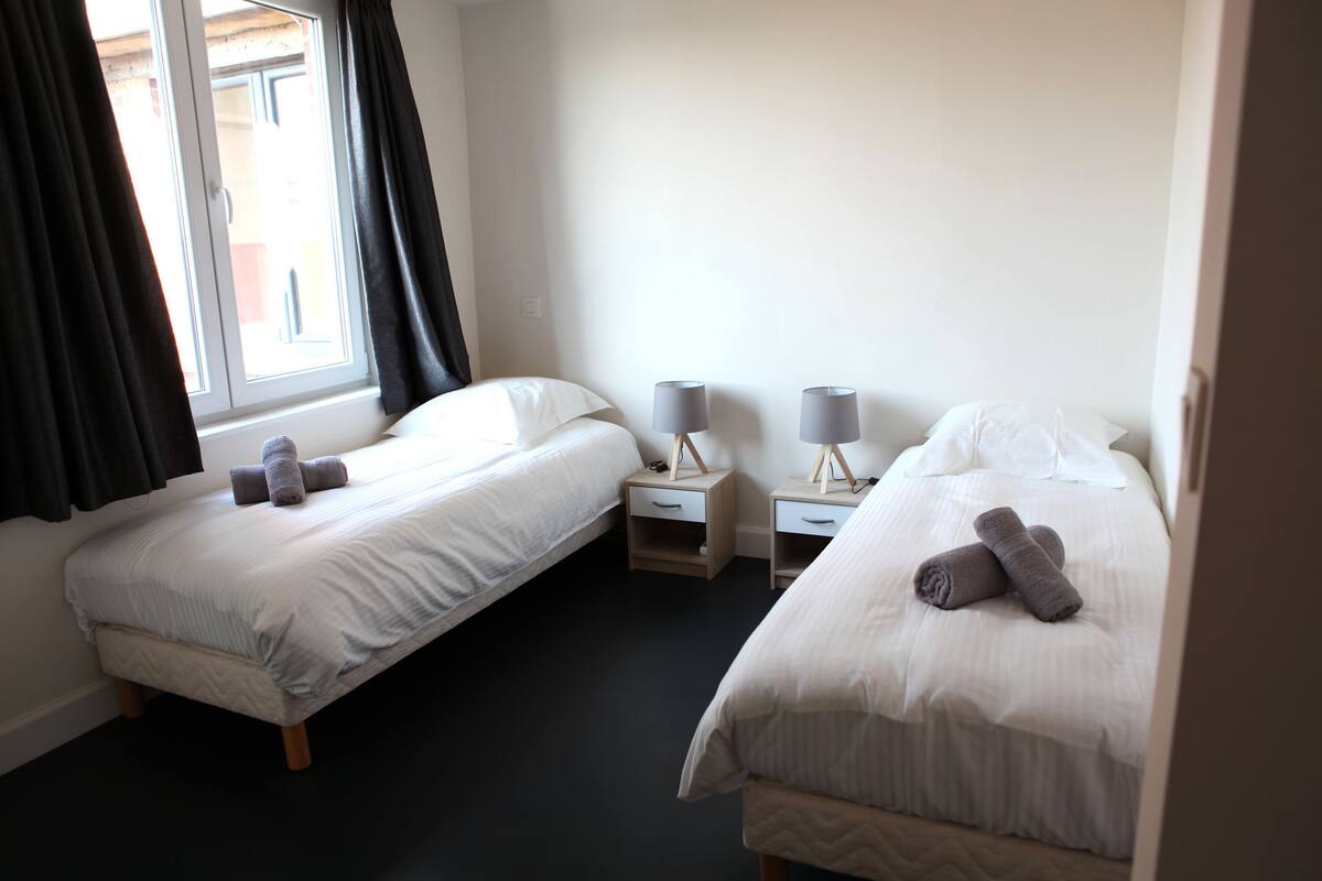 Desk, blackout drapes, free WiFi, bed sheets