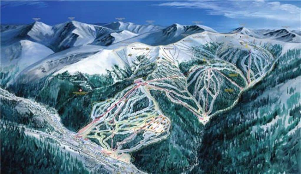 A detailed map of a ski resort with marked trails and lifts.
