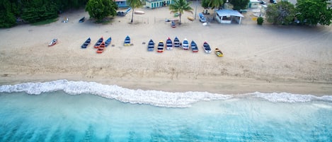 Na praia, toalhas de praia