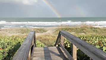 On the beach, sun-loungers, beach towels