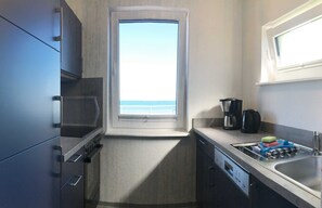 Fridge, oven, dishwasher, coffee/tea maker